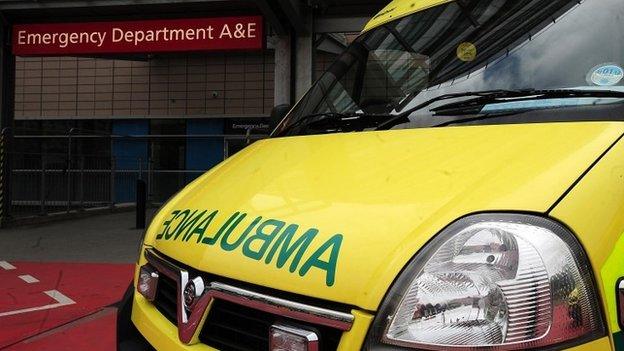 Ambulance outside the entrance to a hospital Accident and Emergency