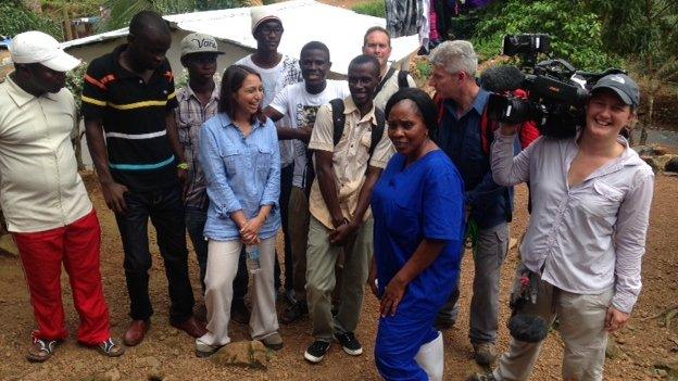 The BBC crew filming in a village just outside Freetown