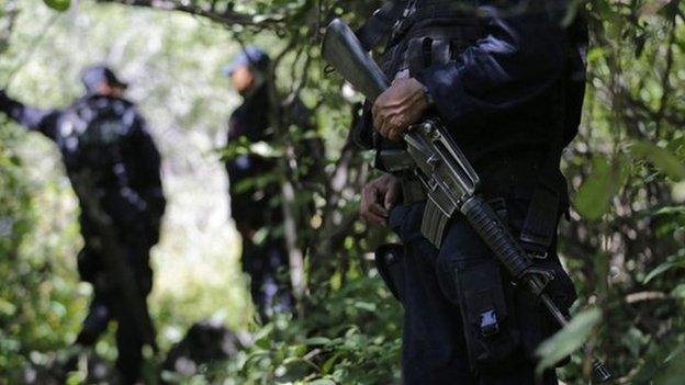 Police guard clandestine graves found in Iguala Guerrero state 9 October 2014