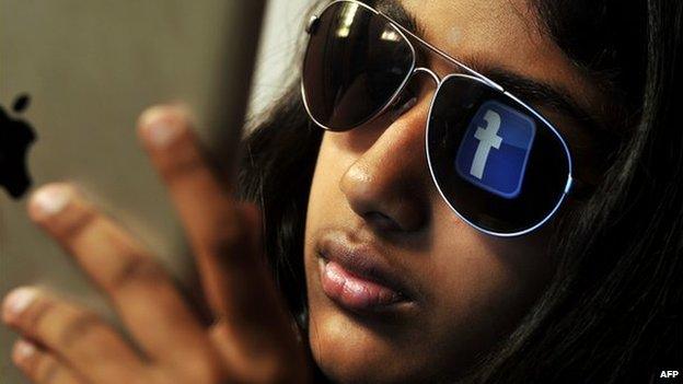 An Indian girl uses Facebook