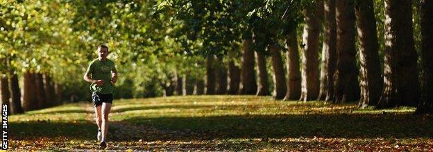 Woman running in a park