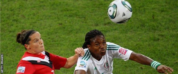 Nigeria's forward Desire Oparanozie (right) in action at the 2011 Women's world Cup