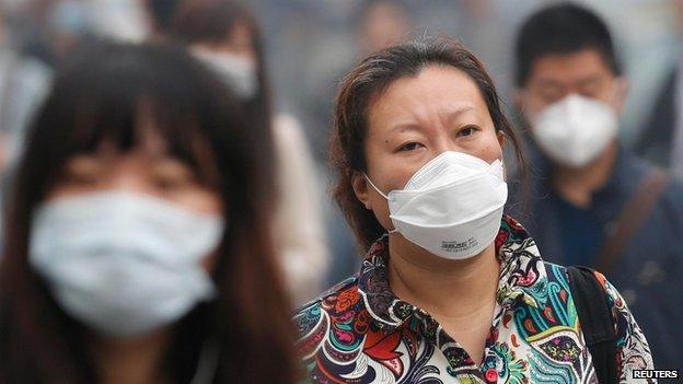 Woman in smog mask, Beijing (10 Oct)