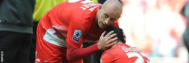 Scott Cuthbert comforts Chris Dagnall after Leyton Orient's play-off defeat at Wembley in May