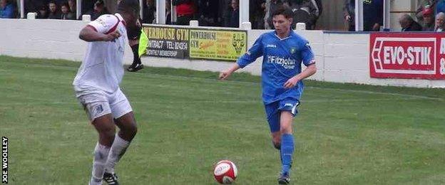 Joe Woolley playing for his new club, Market Drayton Town