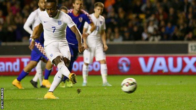 West Brom striker Saido Berahino scores a late penalty as England's Under-21s beat Croatia in their Euro 2015 play-off first leg