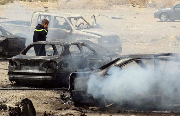 The aftermath of a car bomb near a Shiite mosque in Kirkuk, July 2014