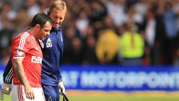 An injured Andy Reid walks off the pitch after being hurt in the game against Derby County in September