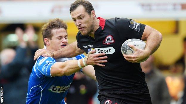 Tim Visser goes past Hallam Amos to score a try for Edinburgh