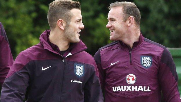 Jack Wilshere and Wayne Rooney