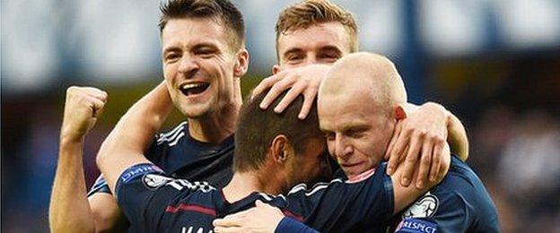 Scotland celebrate the breakthrough goal at Ibrox