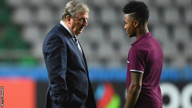 Roy Hodgson consoles Raheem Sterling in Tallinn