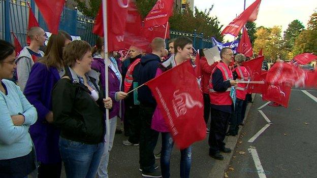 Health workers are striking in a dispute over pay