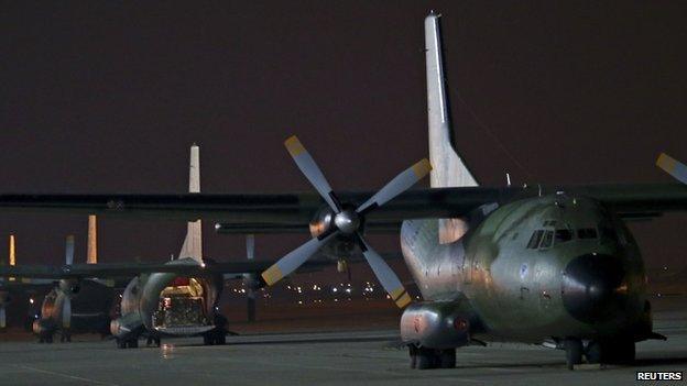 German Bundeswehr Transall C-160 plane carrying humanitarian aid stands on tarmac at Incirlik airbase near Adana, on 15 August 2014.
