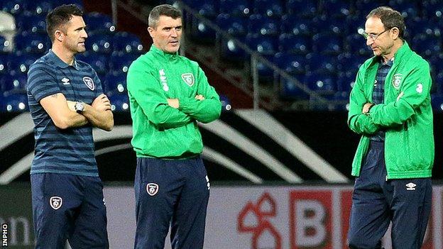 Republic captain Robbie Keane, assistant boss Roy Keane and boss Martin O'Neill in discussion at Stadion Gelsenkirchen