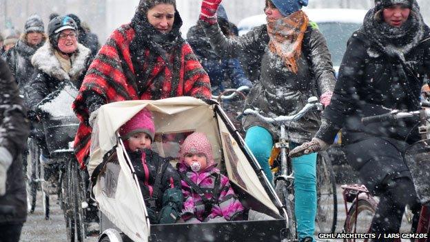 Danes cycling in snow