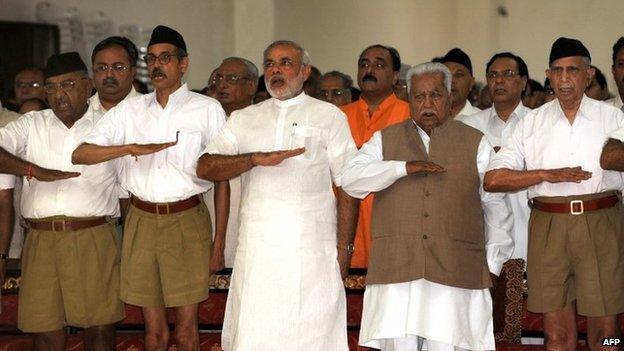 In this photograph taken on September 6, 2009, Narendra Modi (3L) and former chief minister Keshubhai Patel (2R, front) at an RSS gathering in Gujarat