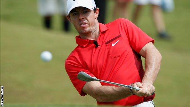 Rory McIlroy plays a chip shot in Bermuda