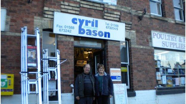 David Evans and Cecilia Motley outside his hardware shop