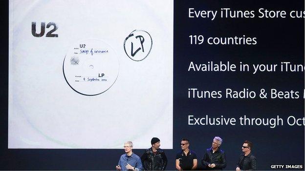 U2 and Apple chief executive Tim Cook