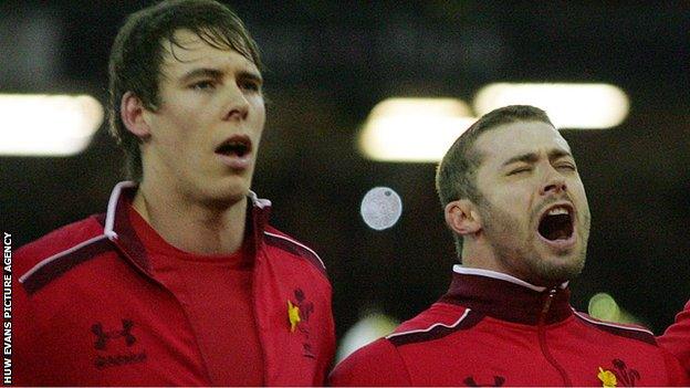 Liam Williams and Leigh Halfpenny singing the Welsh national anthem before an international