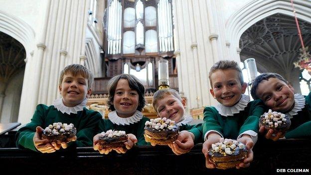 Choir boys with cakes at Bath Abbey