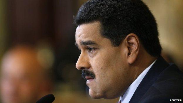 Nicolas Maduro gives a news conference at Miraflores Palace in Caracas on 15 October 2014