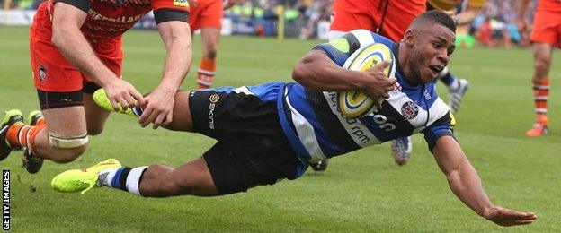 Kyle Eastmond dives over to score for Bath against Leicester