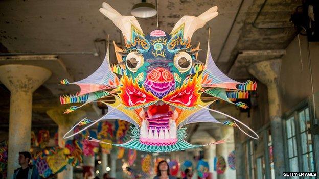 A visitor examines With Wind, an installation by Chinese artist Ai WeiWei