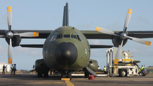 A C160 German aircraft is loaded with supplies at Ghana's international airport in Accra before flying to the Ebola affected region in West Africa - 15 October 2014