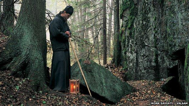 Monk in a forest