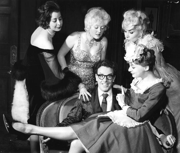 Brian Rix (seated) in the farce "Between The Balance Sheets"