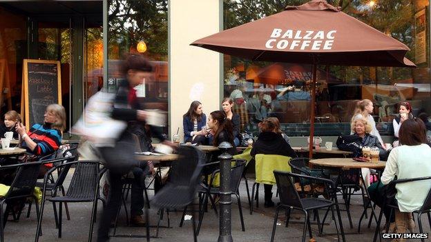 People sitting outside a cafe in Berlin