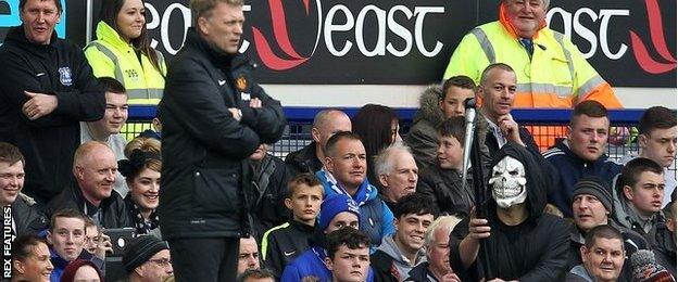 A fan dressed as the Grim Reaper taunted David Moyes in his last game in charge of Manchester United