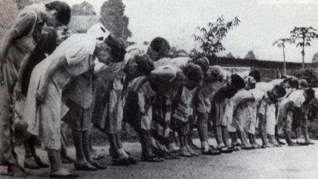 Women bowing