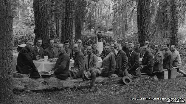 Men eat outdoors