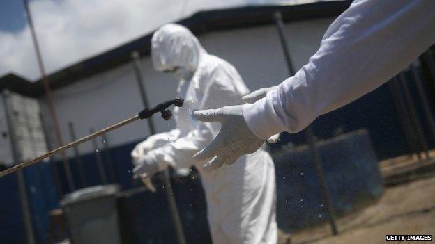 Health worker in Monrovia, Liberia, 17 October 2014