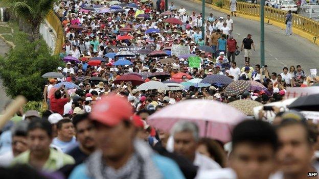 Protesters in Acapulco march along the sea front Oct 17 2014