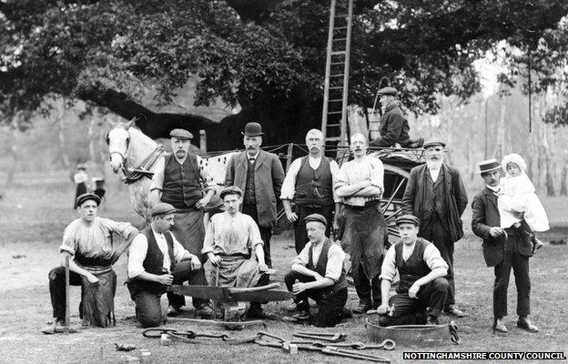 Workmen in front of the Major Oak