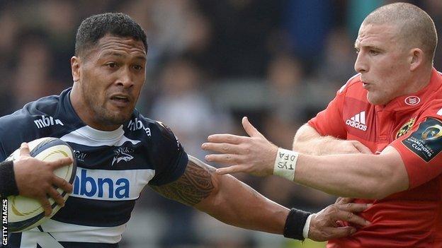 Johnny Leota of Sale tries to get past Munster opponent Andrew Conway during the European Champions Cup match