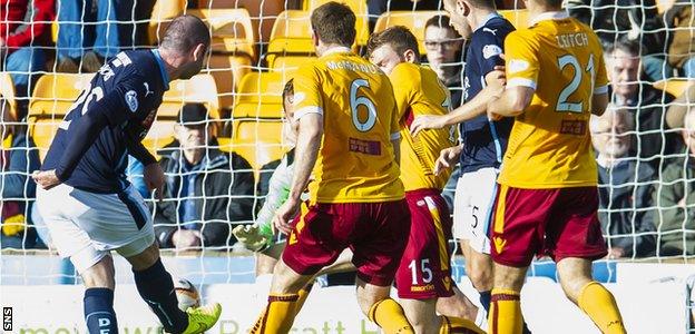 Gary Harkins nets Dundee's second goal of the game in the 3-1 triumph over Motherwell