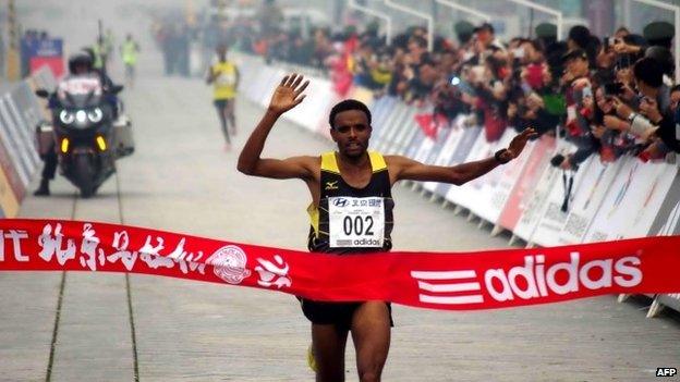 Ethiopia"s Girmay Birhanu Gebru wins the 34th Beijing International Marathon