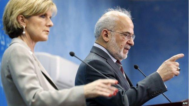 Iraqi Foreign Minister Ibrahim al-Jaafari (R) speaks as Australian Foreign Minister Julie Bishop looks on at a press conference in Baghdad on October 18