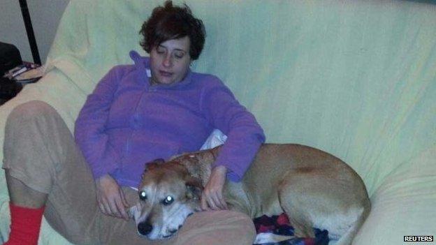 Teresa Romero Ramos, the Spanish nurse who contracted Ebola, is pictured with her dog Excalibur in this undated handout photo provided on 8 October 2014