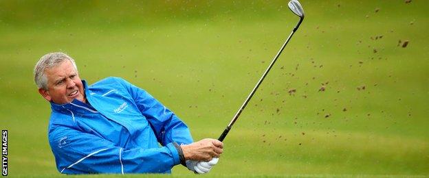 Colin Montgomerie plays out from the bunker during the third round of the 2014 Alfred Dunhill Links Championship