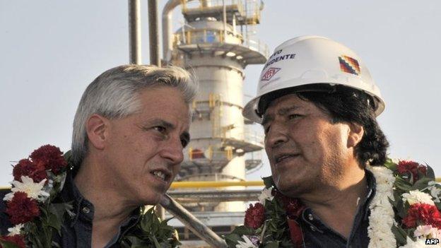 Bolivian President Evo Morales (right) and Vice-President Alvaro Garcia Linera chat during the inauguration of the gas separation and liquefaction plant Gran Chaco on 16 October, 2014