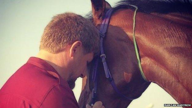 Ramzan Kadyrov with a horse