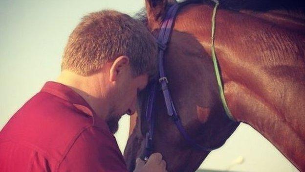 Ramzan Kadyrov with a horse