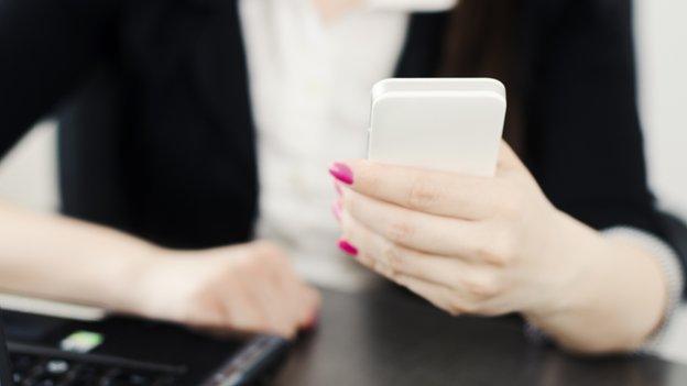 Woman checking phone