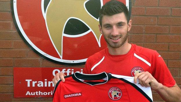 Walsall's on-loan midfielder Michael Cain